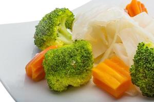 Boiled cabbage and broccoli photo