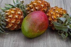 Mini pineapple and mango photo