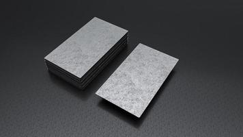 tarjeta de metal duro portátil de aluminio tarjetas de visita galvanizadas en un suelo oscuro. representación 3d foto