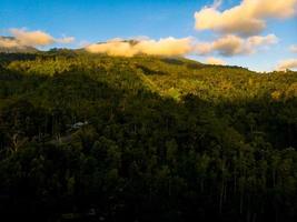 Aerial shot of mountain with clouds photo