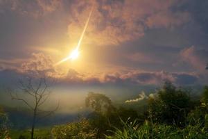 Beautiful panorama in misty mountain forest with sunlight photo