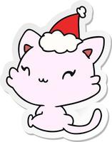 pegatina navideña caricatura de gato kawaii vector