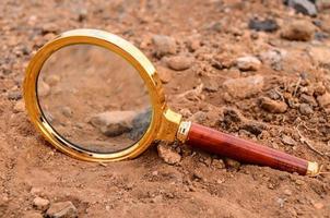 Magnifying Glass Abandoned On The Desert photo