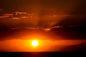 Orange sky and clouds photo