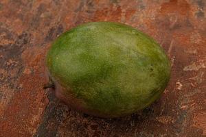 Tropical fruit - Green sweet mango photo