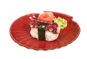 Japanese sushi with meat octopus on a white background photo