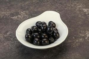 Black olives in the bowl photo