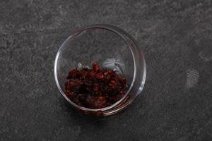 Fried chili pepper sauce with oil photo