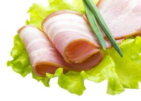 Bacon with salad leaves photo