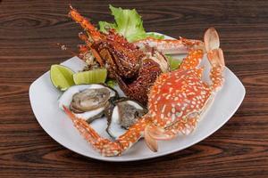 Spiny lobster, crab and oyster photo