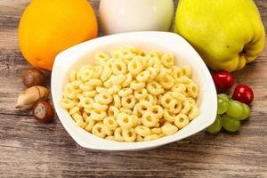 Breakfast with corn rings and milk photo