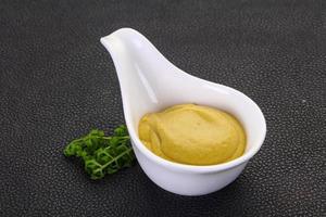 Mustard sauce in the bowl photo