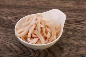 Marinated squid slices in the bowl photo