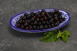 Fresh ripe sweet black currant photo