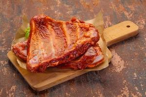 Raw marinated pork ribs photo