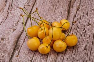 Sweet ripe yellow cherry heap photo