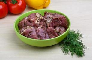 Raw marinated meat for bbq photo