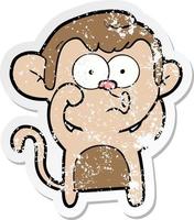 distressed sticker of a cartoon hooting monkey vector