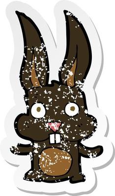 retro distressed sticker of a cartoon rabbit