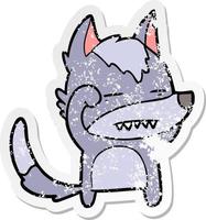 distressed sticker of a cartoon wolf showing teeth vector