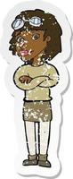 retro distressed sticker of a cartoon woman with crossed arms and safety goggles