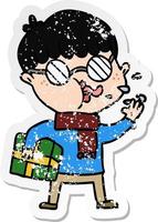 distressed sticker of a cartoon boy wearing spectacles with christmas gift vector