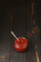 homemade strawberry jam in jar photo