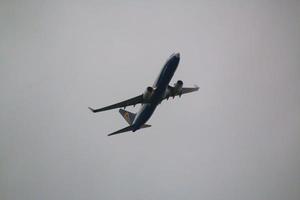 Manchester in the UK in June 2022. A view of an Aeroplane taking off from Manchester airport photo