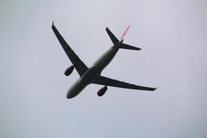 Manchester in the UK in June 2022. A view of an Aeroplane taking off from Manchester airport photo