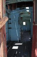 Inside an abandoned train wagon in Death Valley, California photo