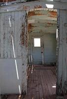 Inside an abandoned train wagon in Death Valley, California photo