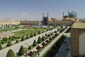 Isfahan, Iran - June 13, 2018 - View over the big city square Naqsch-e Dschahan in Isfahan, Iran. The square is a popular meeting spot for the inhabitants of the city. photo