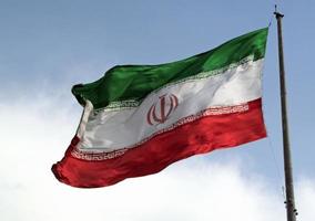 Big Iranian Flag Waving in the Wind photo