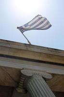Greek national flag waving in the wind photo