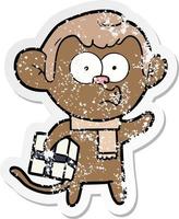 distressed sticker of a cartoon christmas monkey vector