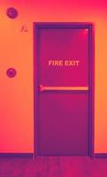 Fire exit door. Fire exit emergency door red color metal material photo