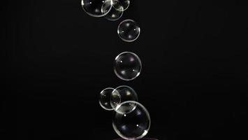 Soap bubble drop or Shampoo bubbles floating like flying in the air photo