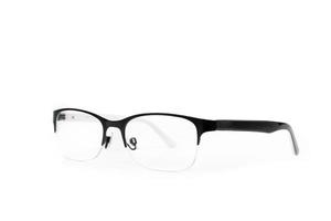 Simple glasses bold black frame on the top of lens. It's isolated from background and  lays on the white background in studio light. photo