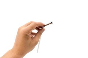 Asian man hand holding Curve Stainless straw on the white background. photo