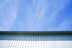 The metal sheet background with blue sky. photo