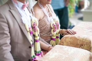 Traditional Thai wedding ceremony in local luxury vintage costume and wedding equipment. photo