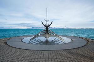 Reykjavik, Iceland - March 27 2016 - The sun voyager one of the Icelandic famous sculpture in Reykjavik the capital city of Iceland. photo