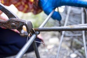 Workers are tying steel to make steel structures for building houses. photo