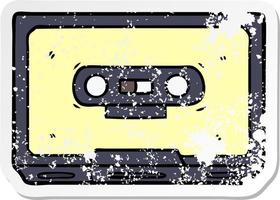 distressed sticker of a cartoon old cassette tape vector