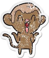 distressed sticker of a cartoon laughing monkey vector