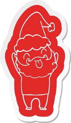 man with beard sticking out tongue wearing santa hat