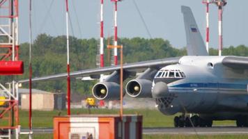 NOVOSIBIRSK, RUSSIAN FEDERATION   JUNY 12, 2022 - Heavy cargo transport aircraft IL 76MD taxis to the terminal after landing at Tolmachevo airport video