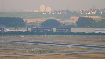 Jet airplane approaching to land, long shot. Tourism and travel concept video