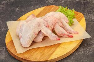 Raw chicken wings for cooking photo