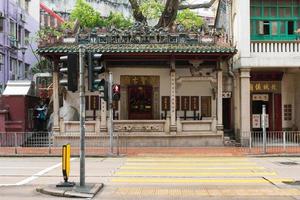 Hong Kong,March 25,2019 exterior view of the small Hung Shing Temple located in Wan Chai, Hong Kong during a cloudy day photo